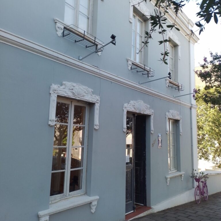 Fachada do Museu Municipal de Guaporé, casarão histórico com janelas ornamentadas